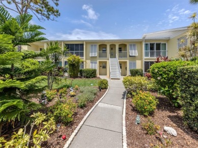 Light and bright ground floor two-bedroom, two-bath home enjoys on Plantation Golf and Country Club in Florida - for sale on GolfHomes.com, golf home, golf lot