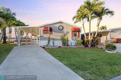 Welcome to your dream home! This fully furnished, impeccably on The Club at Emerald Hills in Florida - for sale on GolfHomes.com, golf home, golf lot