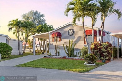 Welcome to your dream home! This fully furnished, impeccably on The Club at Emerald Hills in Florida - for sale on GolfHomes.com, golf home, golf lot