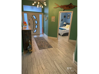 Completely remodeled home in The Peninsula Golf Resort on Peninsula Golf and Racquet Club in Alabama - for sale on GolfHomes.com, golf home, golf lot