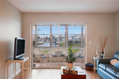 Discover this unbeatable TURN-KEY first-floor LAKE view condo in on Cypress Lake Country Club in Florida - for sale on GolfHomes.com, golf home, golf lot