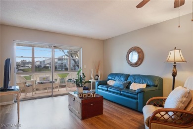 Discover this unbeatable TURN-KEY first-floor LAKE view condo in on Cypress Lake Country Club in Florida - for sale on GolfHomes.com, golf home, golf lot