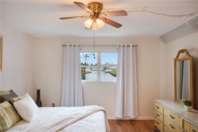Discover this unbeatable TURN-KEY first-floor LAKE view condo in on Cypress Lake Country Club in Florida - for sale on GolfHomes.com, golf home, golf lot