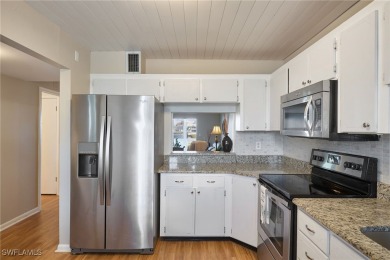 Discover this unbeatable TURN-KEY first-floor LAKE view condo in on Cypress Lake Country Club in Florida - for sale on GolfHomes.com, golf home, golf lot