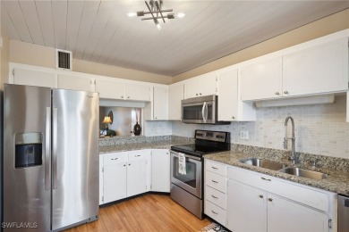 Discover this unbeatable TURN-KEY first-floor LAKE view condo in on Cypress Lake Country Club in Florida - for sale on GolfHomes.com, golf home, golf lot