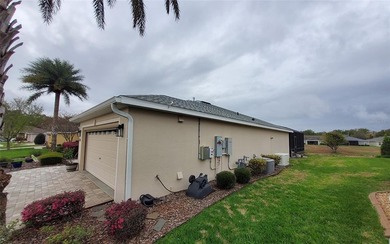 Welcome to your energy efficient home equipped with a new roof on Arlington Ridge Golf Club in Florida - for sale on GolfHomes.com, golf home, golf lot