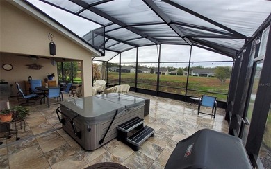 Welcome to your energy efficient home equipped with a new roof on Arlington Ridge Golf Club in Florida - for sale on GolfHomes.com, golf home, golf lot