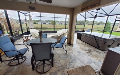 Welcome to your energy efficient home equipped with a new roof on Arlington Ridge Golf Club in Florida - for sale on GolfHomes.com, golf home, golf lot