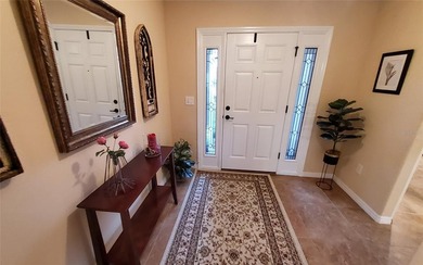 Welcome to your energy efficient home equipped with a new roof on Arlington Ridge Golf Club in Florida - for sale on GolfHomes.com, golf home, golf lot