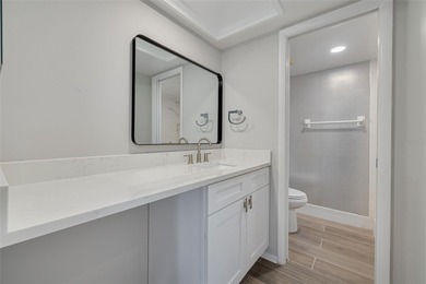 Welcome home to this beautifully updated second-floor condo on East Lake Woodlands Country Club in Florida - for sale on GolfHomes.com, golf home, golf lot