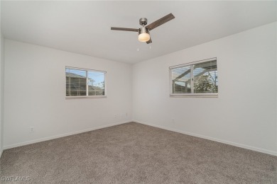 Priced well below comparable homes, This charming single-level on Palmetto-Pine Country Club in Florida - for sale on GolfHomes.com, golf home, golf lot