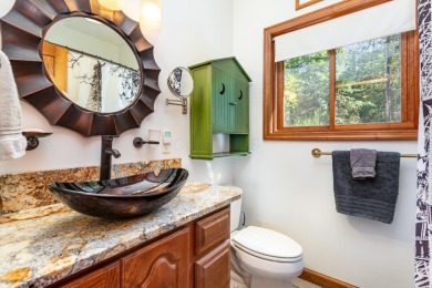 Beautifully maintained raised ranch setting above the end of a on Hide-A-Way Hills Golf Club in Ohio - for sale on GolfHomes.com, golf home, golf lot