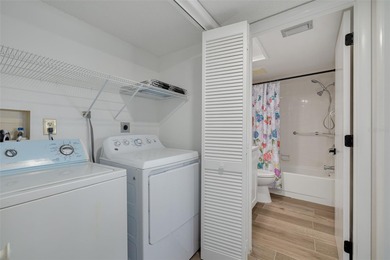 Welcome home to this beautifully updated second-floor condo on East Lake Woodlands Country Club in Florida - for sale on GolfHomes.com, golf home, golf lot