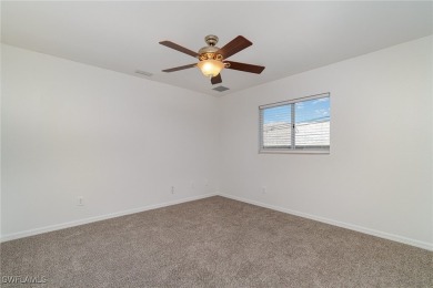 Priced well below comparable homes, This charming single-level on Palmetto-Pine Country Club in Florida - for sale on GolfHomes.com, golf home, golf lot