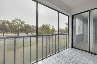 Welcome home to this beautifully updated second-floor condo on East Lake Woodlands Country Club in Florida - for sale on GolfHomes.com, golf home, golf lot