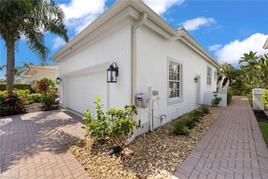 This beautifully renovated 3-bedroom, 3-bath single-family pool on Windstar on Naples Bay in Florida - for sale on GolfHomes.com, golf home, golf lot