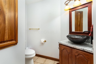 Beautifully maintained raised ranch setting above the end of a on Hide-A-Way Hills Golf Club in Ohio - for sale on GolfHomes.com, golf home, golf lot