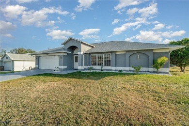 Priced well below comparable homes, This charming single-level on Palmetto-Pine Country Club in Florida - for sale on GolfHomes.com, golf home, golf lot
