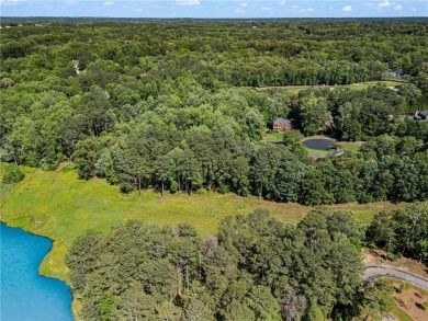 Discover the epitome of luxury living with this spectacular 5 on Trophy Club of Atlanta in Georgia - for sale on GolfHomes.com, golf home, golf lot