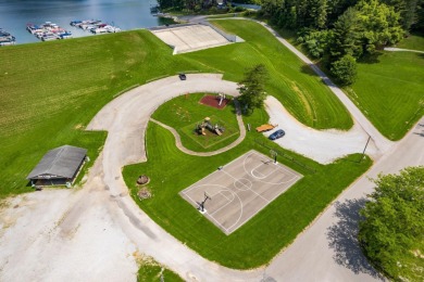 Beautifully maintained raised ranch setting above the end of a on Hide-A-Way Hills Golf Club in Ohio - for sale on GolfHomes.com, golf home, golf lot