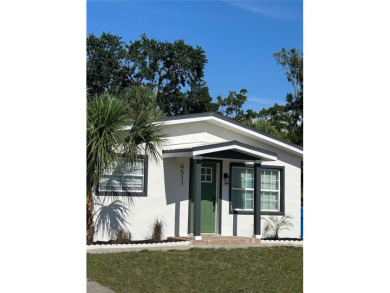 Welcome to this beautifully renovated 4-bedroom, 2-bathroom on Rocky Point Golf Course in Florida - for sale on GolfHomes.com, golf home, golf lot