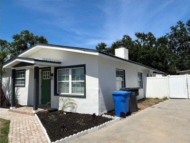 Welcome to this beautifully renovated 4-bedroom, 2-bathroom on Rocky Point Golf Course in Florida - for sale on GolfHomes.com, golf home, golf lot