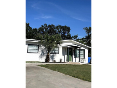 Welcome to this beautifully renovated 4-bedroom, 2-bathroom on Rocky Point Golf Course in Florida - for sale on GolfHomes.com, golf home, golf lot
