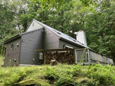 This could be your dream house! Nestled in the B Section, this on Hermitage Club Golf Course in Vermont - for sale on GolfHomes.com, golf home, golf lot