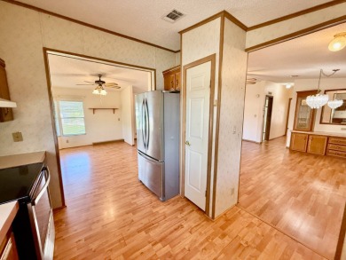 Home is located in Water Oak Country Club Estates an active 55 on Water Oak Country Club Estates in Florida - for sale on GolfHomes.com, golf home, golf lot
