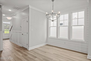 Discover this exceptional home in The Beaufort Club, a premier on North River Club in North Carolina - for sale on GolfHomes.com, golf home, golf lot