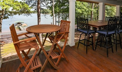 This stunning property embodies the essence of lakefront living on The Trail At Chickasaw Pointe in South Carolina - for sale on GolfHomes.com, golf home, golf lot