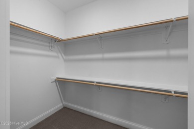 Discover this exceptional home in The Beaufort Club, a premier on North River Club in North Carolina - for sale on GolfHomes.com, golf home, golf lot