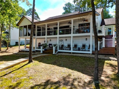 This stunning property embodies the essence of lakefront living on The Trail At Chickasaw Pointe in South Carolina - for sale on GolfHomes.com, golf home, golf lot