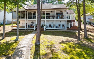 This stunning property embodies the essence of lakefront living on The Trail At Chickasaw Pointe in South Carolina - for sale on GolfHomes.com, golf home, golf lot