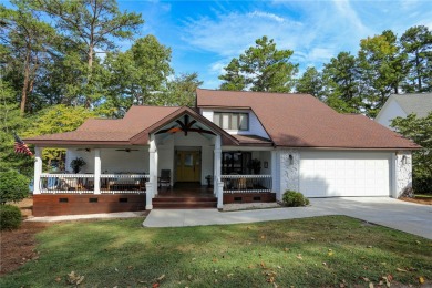 This stunning property embodies the essence of lakefront living on The Trail At Chickasaw Pointe in South Carolina - for sale on GolfHomes.com, golf home, golf lot