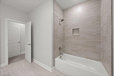 Discover this exceptional home in The Beaufort Club, a premier on North River Club in North Carolina - for sale on GolfHomes.com, golf home, golf lot