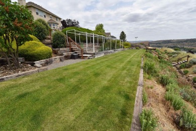 Welcome to your dream home! Nestled amidst lush landscaping and on Quail Ridge Golf Course in Washington - for sale on GolfHomes.com, golf home, golf lot