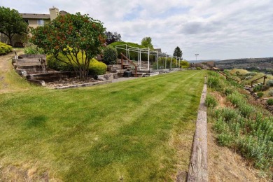 Welcome to your dream home! Nestled amidst lush landscaping and on Quail Ridge Golf Course in Washington - for sale on GolfHomes.com, golf home, golf lot