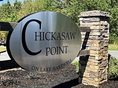 This stunning property embodies the essence of lakefront living on The Trail At Chickasaw Pointe in South Carolina - for sale on GolfHomes.com, golf home, golf lot