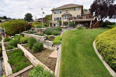 Welcome to your dream home! Nestled amidst lush landscaping and on Quail Ridge Golf Course in Washington - for sale on GolfHomes.com, golf home, golf lot