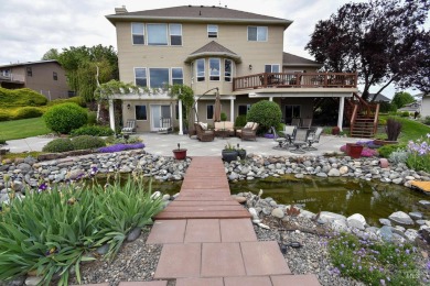 Welcome to your dream home! Nestled amidst lush landscaping and on Quail Ridge Golf Course in Washington - for sale on GolfHomes.com, golf home, golf lot