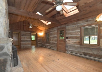 3 bedroom cabin on 4 beautiful wooded lots totaling 1.88 acres on Hide-A-Way Hills Club in Ohio - for sale on GolfHomes.com, golf home, golf lot
