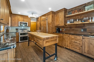 RESORT LIVING AT ITS FINEST! Immaculate Lake Harmony home offers on Split Rock Resort and Country Club in Pennsylvania - for sale on GolfHomes.com, golf home, golf lot