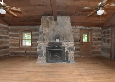 3 bedroom cabin on 4 beautiful wooded lots totaling 1.88 acres on Hide-A-Way Hills Club in Ohio - for sale on GolfHomes.com, golf home, golf lot