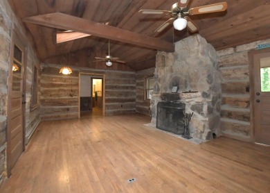 3 bedroom cabin on 4 beautiful wooded lots totaling 1.88 acres on Hide-A-Way Hills Club in Ohio - for sale on GolfHomes.com, golf home, golf lot