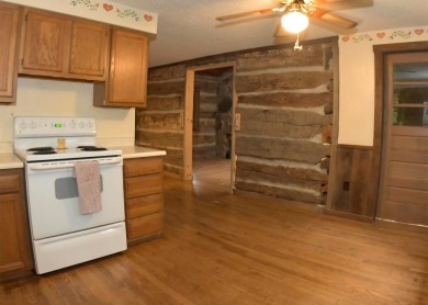 3 bedroom cabin on 4 beautiful wooded lots totaling 1.88 acres on Hide-A-Way Hills Club in Ohio - for sale on GolfHomes.com, golf home, golf lot