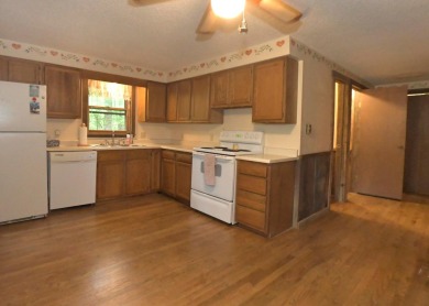 3 bedroom cabin on 4 beautiful wooded lots totaling 1.88 acres on Hide-A-Way Hills Club in Ohio - for sale on GolfHomes.com, golf home, golf lot