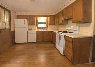 3 bedroom cabin on 4 beautiful wooded lots totaling 1.88 acres on Hide-A-Way Hills Club in Ohio - for sale on GolfHomes.com, golf home, golf lot