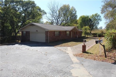 Needing large home with plenty of space?  Check out this 2 level on Harrison Country Club in Arkansas - for sale on GolfHomes.com, golf home, golf lot