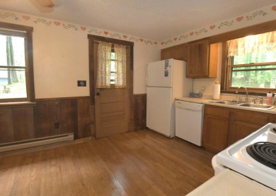 3 bedroom cabin on 4 beautiful wooded lots totaling 1.88 acres on Hide-A-Way Hills Club in Ohio - for sale on GolfHomes.com, golf home, golf lot